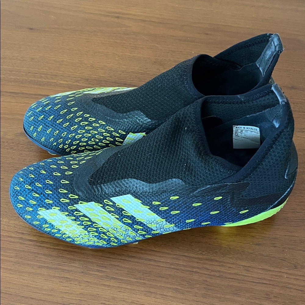 Adidas Black and Blue Cleats with Yellow Accents